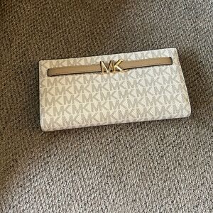 Michael Kors Beige Monogram Clutch